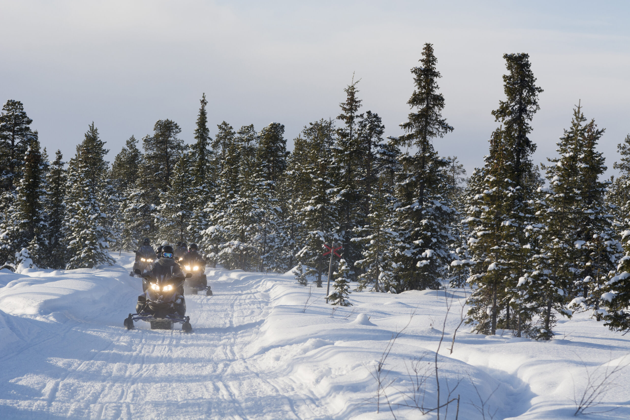 Group of people on snowmobiles, Jukkasjarvi, Sweden