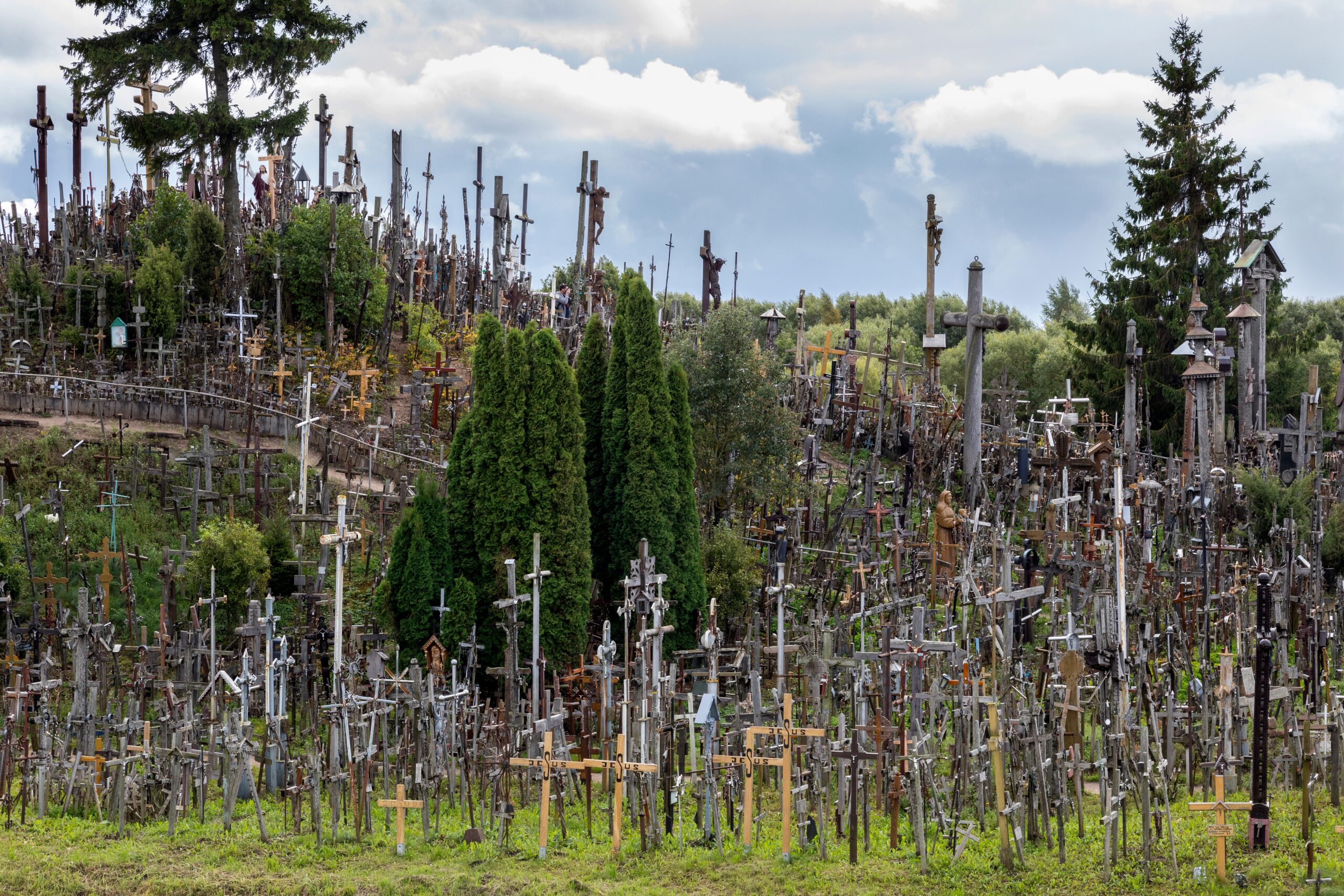 Hill of Crosses; Siauliai; Lithuania; religion; cross; crucifix; virgin mary; effigies; rosaries; many; pilgrimage; religion; religious; Christian; Christianity; Catholic; Lithuanian; Baltic States; travel; tourism; hillside; Catholicism; Christ; statue; wood; wooden; faith; monument